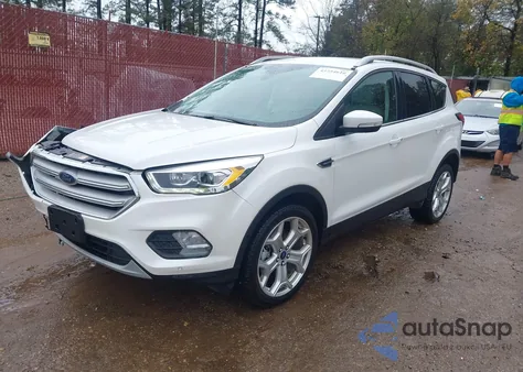 2019 Ford Escape Titanium z USA, uszkodzony, nr VIN 1FMCU9J96KUB75458